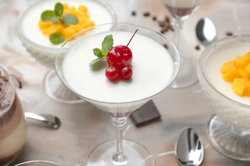 Delicious panna cotta on color background