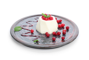 Plate with tasty panna cotta on white background