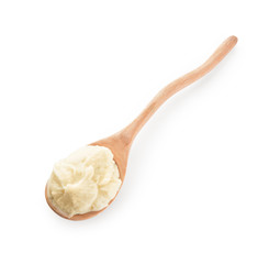 Spoon with tasty mashed potato on white background