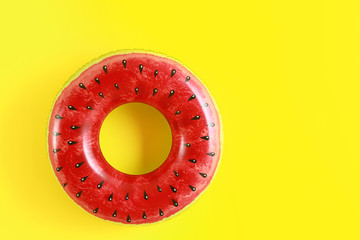 Inflatable ring on color background