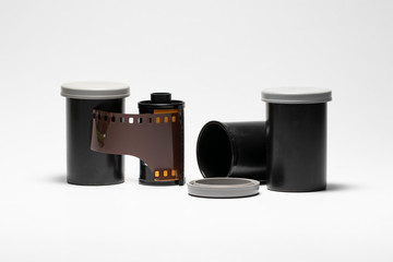 35mm Still Camera Film Old film and film roll, old film camera and film roll on white background