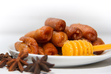 pestiños with port and honey typical of Spanish gastronomy