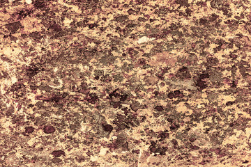 Vintage yellow background. Rough painted wall of aspen gold color. Imperfect plane of golden colored. Uneven old decorative toned backdrop of yellow tint. Texture of gold hue. Ornamental stony surface