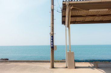 Shimonada train station at Ehime Prefecture, Japan. The non-english character on the pole is the name of the station.