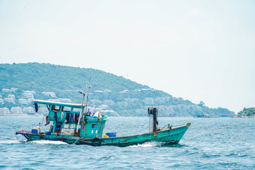Traditional fishermen boats on the ocean of popular Phu Quoc island in south Vietnam