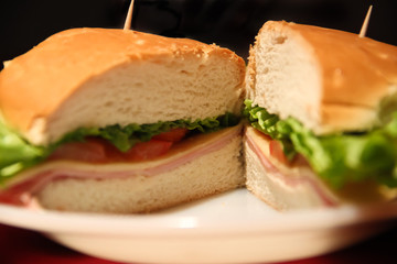 detail of ham cheese lettuce and tomato sandwich