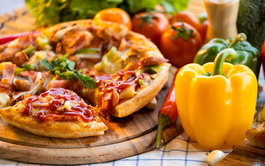  pizza with tomatoes and sweet chilli.