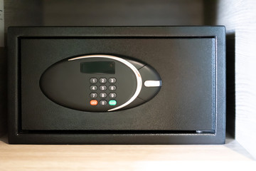 Lock on modern safe box of security metal