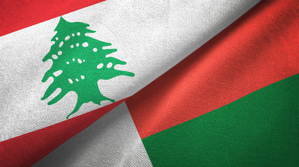 Lebanon and Madagascar two flags textile cloth, fabric texture