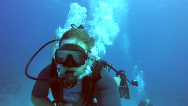 Scuba Diver In Blue Ocean