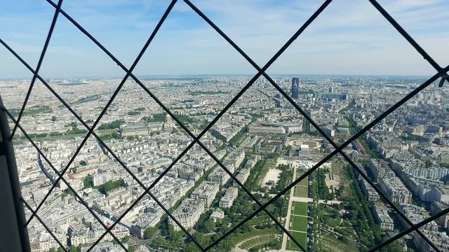 Aerial tourist POV from Eiffel Tower to Champs de Mars in Paris, France, cinematic steadicam stock video