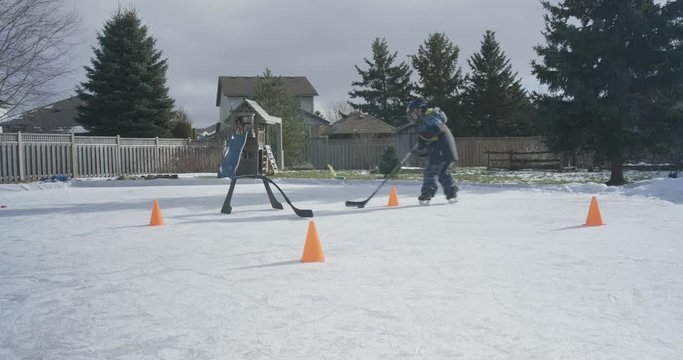 hockey kid backyard rink doing more drils