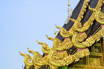 Fototapeta na wymiar White Naga statue in front of the Thai temple