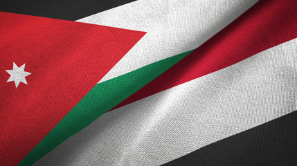 Fototapeta na wymiar Jordan and Yemen two flags textile cloth, fabric texture