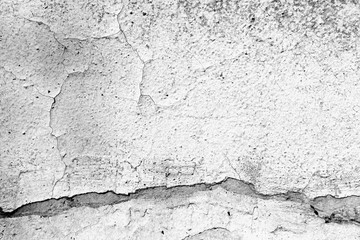 Old painted wall background texture close up. Black and white