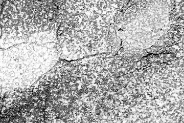 Old painted wall background texture close up. Black and white