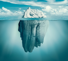Fototapeta na wymiar Iceberg in ocean. Hidden threat or danger concept. Central composition. Toned green.