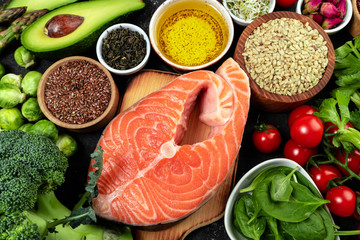 Set of healthy food flat lay. Selection of healthy eating fish, vegetables, beans, antioxidants and...
