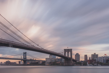 Fototapeta na wymiar Brooklyn and Manhattan bridge over East River with skyline of Brooklyn, viewed from Manhattan, New York, USA