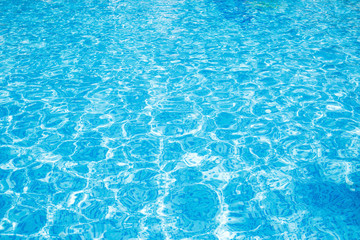 Blue clear water in swimming pool.