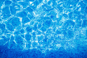 Blue clear water in swimming pool.