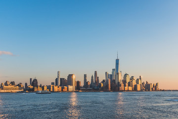 Fototapeta na wymiar Skyline of downtown Manhattan of New York City at dusk, viewed from New Jersey, USA