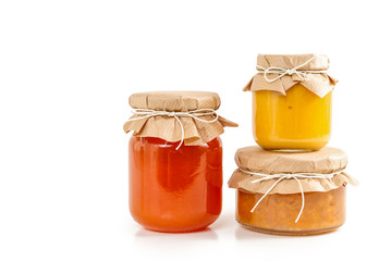 Colorful jams in glass jars