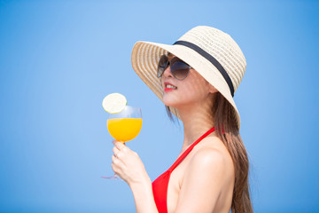 woman enjoy sunshine with juice