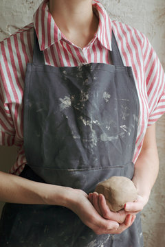 Crop potter with clay piece