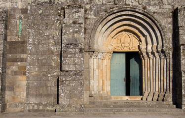 Open door to old stone church. Archway to medieval cathedral. Romanesque architecture concept....