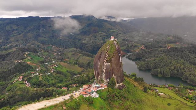 Aerial: Lush Landscape Around the Rock of Guatape in Guatape, Columbia