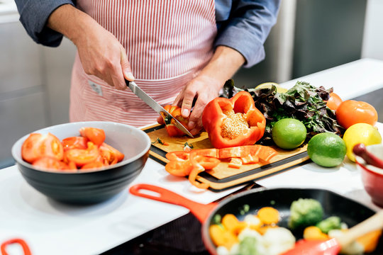 Unrecognizable man cooking
