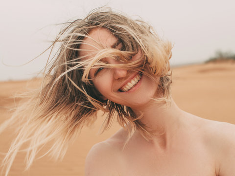 Portrait of young blonde woman