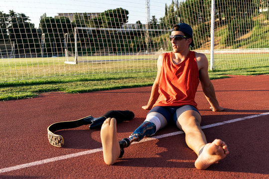 Portrait of disabled man athlete with leg prosthesis