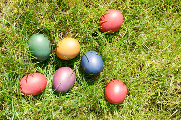 Fototapeta na wymiar colorful Easter eggs lying on meadow