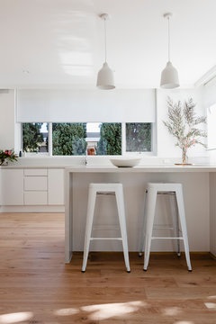 White stools in a scandi kitchen