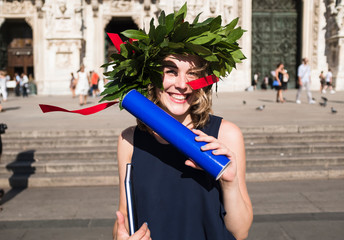 Happy young woman celebrating graduation