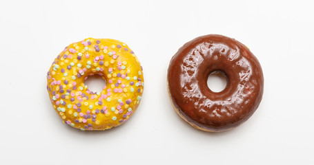 Two doughnuts isolated on white color background, top view