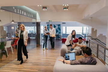 People working separately in the co-working office space