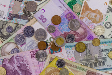 Background of banknotes and coins from different countries