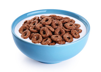 Bowl with chocolate corn rings, milk, yogurt isolated on white background.