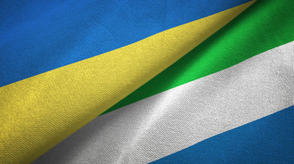 Ukraine and Sierra Leone two flags textile cloth, fabric texture