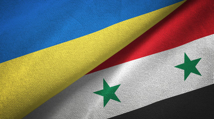 Ukraine and Syria two flags textile cloth, fabric texture