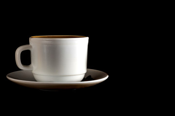 White cup of hot coffee isolated on black background.