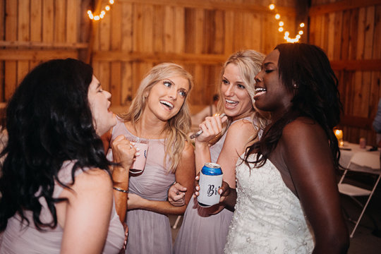 Bridesmaids and Bride Partying at Wedding