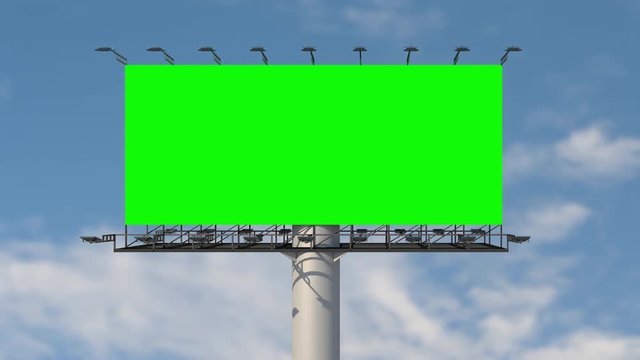 Green screen blank billboard outdoor advertising at blue sky with clouds time lapse background. Space available for advertising ro your message.