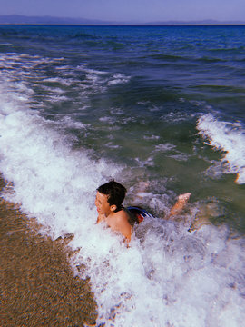 Boy having fun in the sea