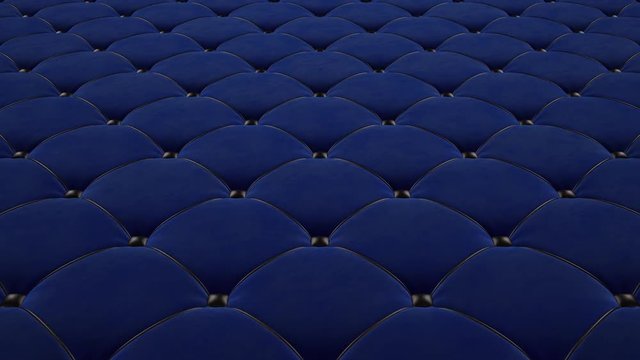3D animation of the flight over a blue quilted velvet surface with black drawstrings. Looped video.