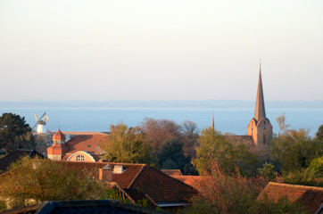 View over a town in morning light.