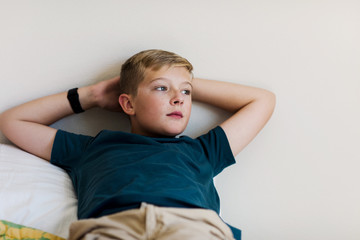 portrait of a preteen boy with something on his mind